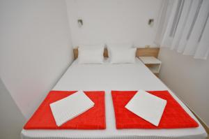 Кровать или кровати в номере Gospostina Apartment