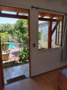 Vista de la piscina de Ventana Sur Hostal o d'una piscina que hi ha a prop