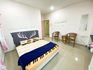 Postel nebo postele na pokoji v ubytování Buntong Homestay -Rooms Only