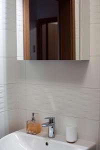 Kúpeľňa v ubytovaní Cute apartman- free parking + 21 fotografií