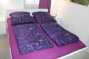 Letto o letti in una camera di HAUS-DONAU in der Wachau