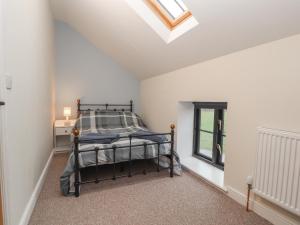 Postel nebo postele na pokoji v ubytování Colomendy Alpaca Farm - Coach House