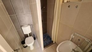 Kúpeľňa v ubytovaní Mediterran Apartman with Pool