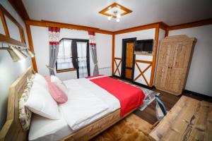 Un pat sau paturi într-o cameră la Colț de Austria