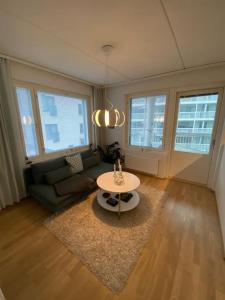 A seating area at Modern two bedroom apartment near Helsinki Airport