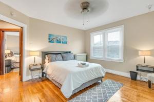 a bedroom with a large bed and a window at Spacious 3BR Home near Downtown, Oakland & East Liberty! Max 15 nights in Pittsburgh