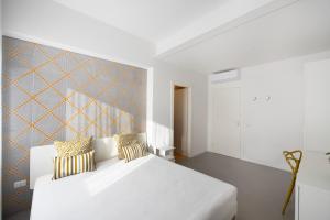 Postel nebo postele na pokoji v ubytování B&B Gemmis in Pompeii