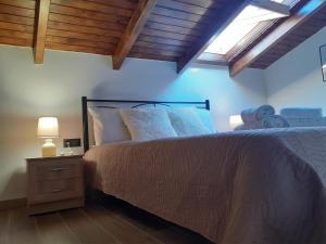 A bed or beds in a room at The view attic