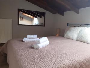 A bed or beds in a room at The view attic