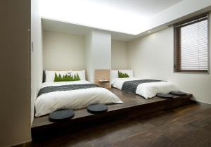 Postel nebo postele na pokoji v ubytování Metro Hotel Myeongdong