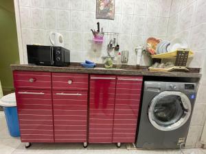 A kitchen or kitchenette at sporting sea view two bedroom appartement Még 16 kép