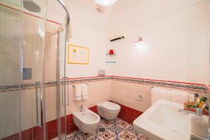Salle de bains dans l'établissement Palazzo Pascal