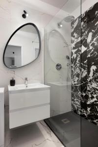 Kúpeľňa v ubytovaní NAP Apartments Nadmotławie Marina + 16 fotografií