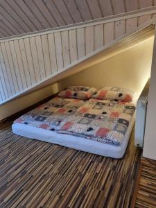 Postel nebo postele na pokoji v ubytování Vila Almini Drienica Lysa