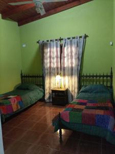 Tempat tidur dalam kamar di La mandarina