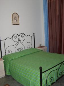 Postel nebo postele na pokoji v ubytování B&B Casa Dei Mille