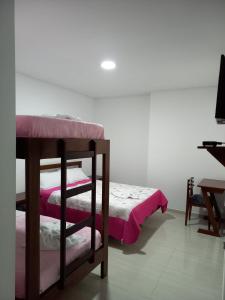Postel nebo postele na pokoji v ubytování Hotel Prestigio JC