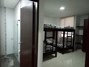Postel nebo postele na pokoji v ubytování Hotel Prestigio JC