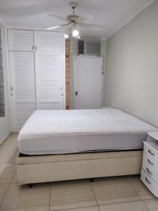 Cama ou camas em um quarto em Apto Itaguá - Ubatuba