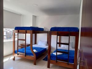 Postel nebo postele na pokoji v ubytování Hotel Prestigio JC