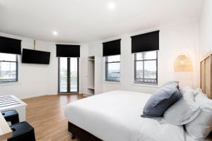 Grand Terminus Hotel客房内的一张或多张床位