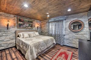 Un dormitorio con una cama en una habitación con paredes de madera. en Medieval-Themed Home with Large Jacuzzi and Theater!, en Taylorsville