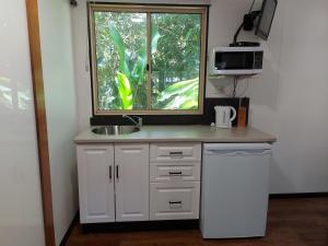 Kuchyň nebo kuchyňský kout v ubytování Litchfield Tourist Park