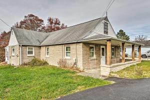 a small house with a gambrel roof at Remodeled Abingdon House with Spacious Yard! in Abingdon