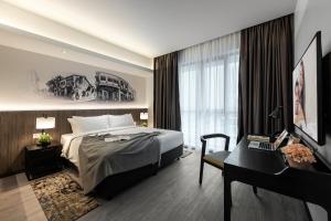 Postel nebo postele na pokoji v ubytování Citadines Prai Penang