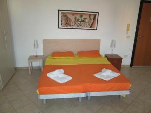 Cama o camas de una habitación en Residence la Piazza