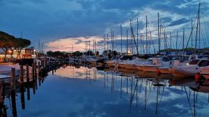 Fotografia z galérie ubytovania Red flat with shared pool and private parking v destinácii Porto Santa Margherita di Caorle