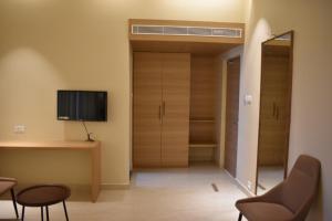 TV a/nebo společenská místnost v ubytování Hotel VPS Grand