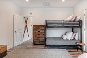 a bedroom with a bunk bed in a room at Quarry Springs Retreat in Park City