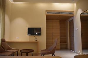 TV a/nebo společenská místnost v ubytování Hotel VPS Grand