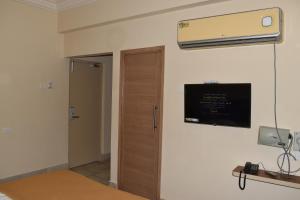 TV a/nebo společenská místnost v ubytování Hotel VPS Grand