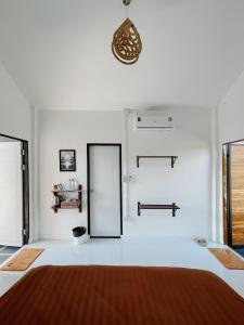 Postel nebo postele na pokoji v ubytování Aether Pai Villa