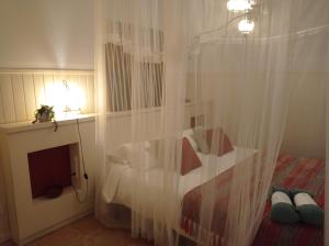 A bed or beds in a room at Blue Home