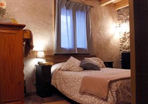 Postel nebo postele na pokoji v ubytování Casa Albana Pirineos