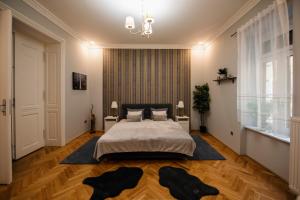 Posteľ alebo postele v izbe v ubytovaní Jacks's Home apartman - free parking