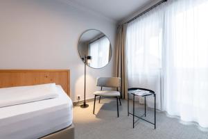 Cama o camas de una habitación en Hotel Jakob
