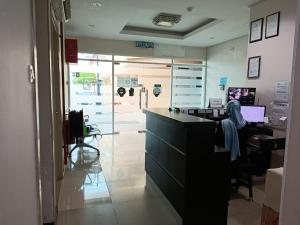 A kitchen or kitchenette at AMBASSADOR LABUAN VIEW HOTEL