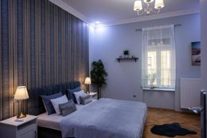 Posteľ alebo postele v izbe v ubytovaní Jacks's Home apartman - free parking