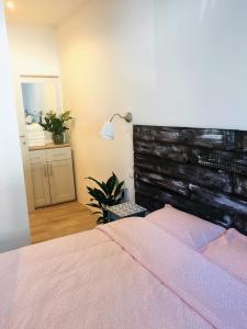 Postel nebo postele na pokoji v ubytování B&B MonteCengio