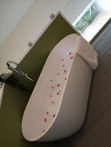 a toilet in a box with hearts on it at Ô'bel Écrin in Aubel