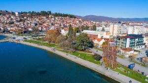 an aerial view of a city next to a body of water at Hotel Nova Riviera in Ohrid