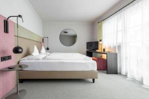 Cama o camas de una habitación en Hotel Jakob