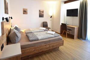 TV a/nebo společenská místnost v ubytování Gasthof Hotel zur Post
