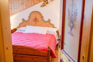 A bed or beds in a room at Appartamento Paola