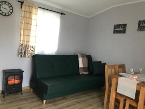 Domki przy Ośrodku Narciarskim Trzepowo的休息区