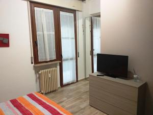 TV a/nebo společenská místnost v ubytování Edoardoapartments1